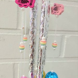 Kimalteleva Tuulikello kaloilla