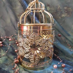 Kaunis kultainen lintuhäkki -lyhty kukkakoristein