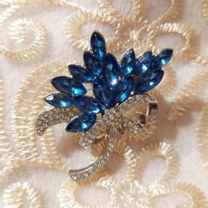 Kaunis Rintakoru, Sini-hopea Ruiskaunokki timanteilla ja kristalleilla