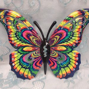 Kaunis, värikäs Metalliperhonen, keltasävyinen