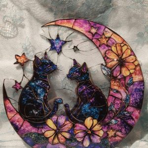 Mystinen Ikkunakoriste, Kissat kuutamolla