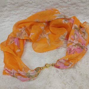 Pirteän oranssi Huivi kukka-kuvioilla ja magneetti-koru kiinnityksellä